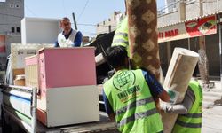 Umut Kervanı, bodrum katta çocuklarıyla eşyasız yaşayan aileye yardımda bulundu